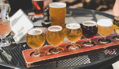 Beers sitting on a table