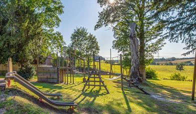 Dilhorne Recreation Playground with slide, swings and zip slide