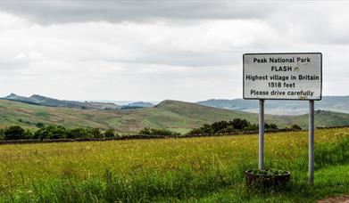 village sign, stating Flash is the highest village in Britain