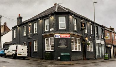 The Sutherland Arms, captured from across the road on a grey, rainy day