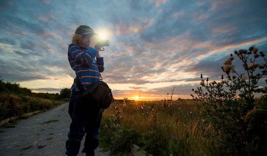 A photographer tests his camera at Middleton Lakes, Staffordshire