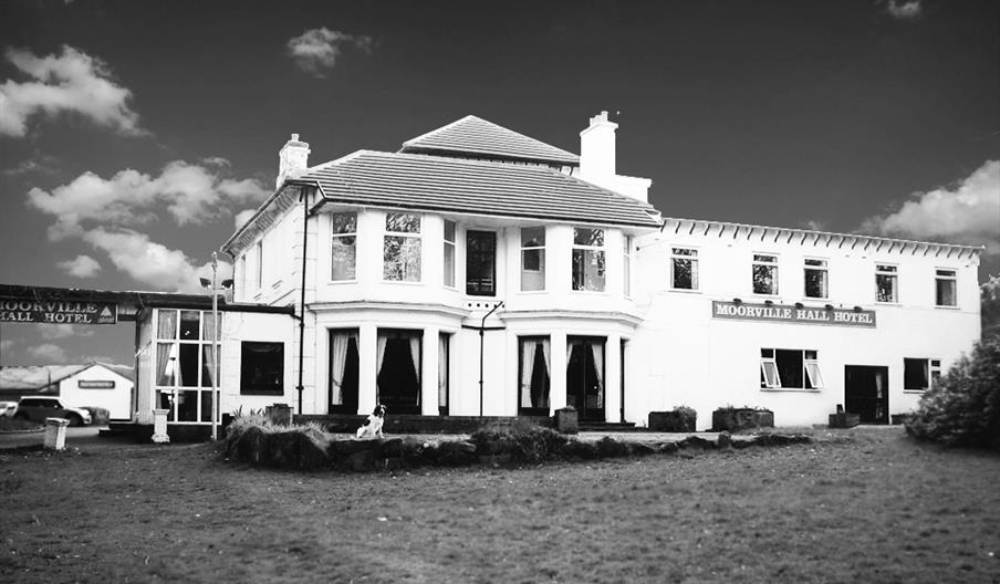 Image shows a black and white shot of the venue, Moorville Hall Hotel
