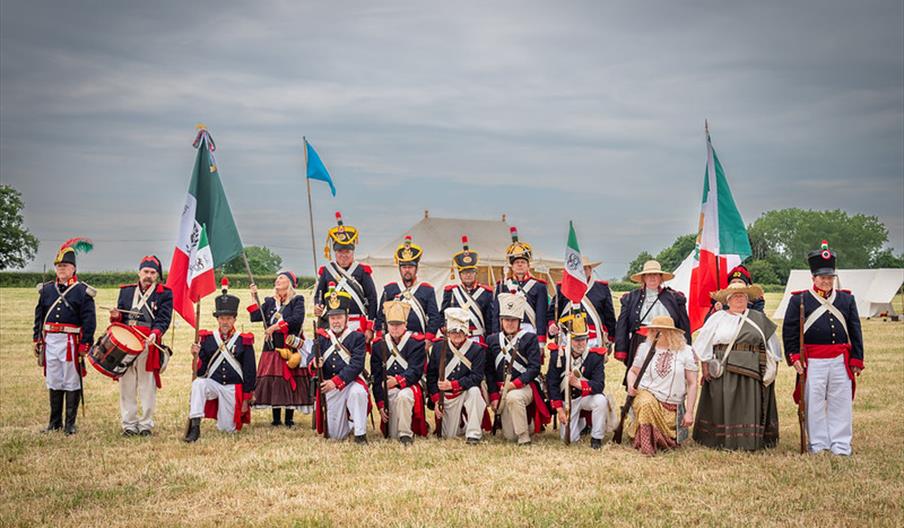 A group of soldiers re-enact a historic battle for a photography workshop