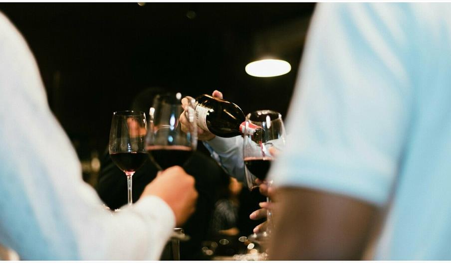 Wine being poured into glasses