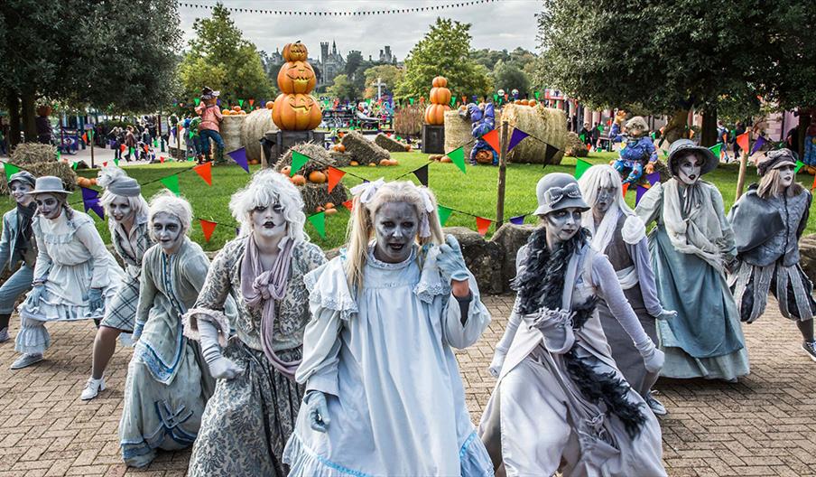 The Alton Ancestors - dancers in spooky costumes - perform a routine