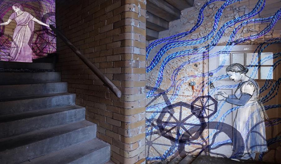 image of staircase with image painted on the walls