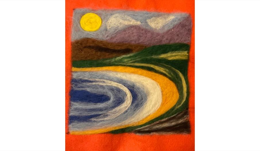 image of a seaside scene made from felt