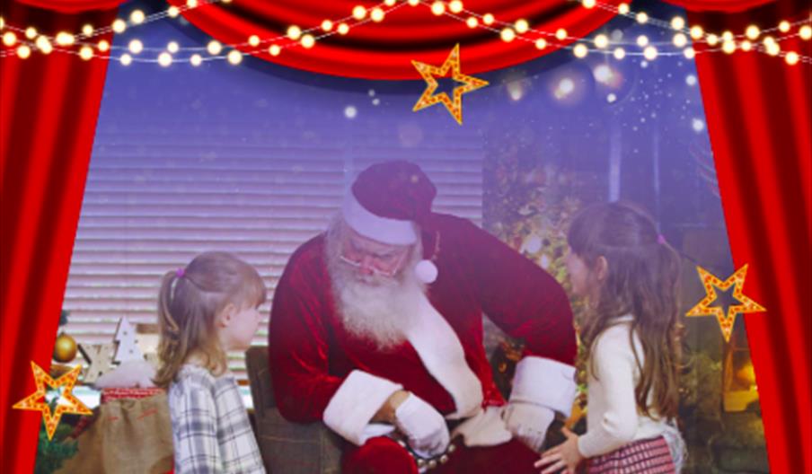 Santa speaks to some younger visitors about what they want for Christmas