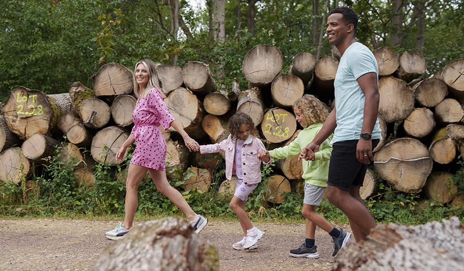 Image shows a family enjoying a summer walk