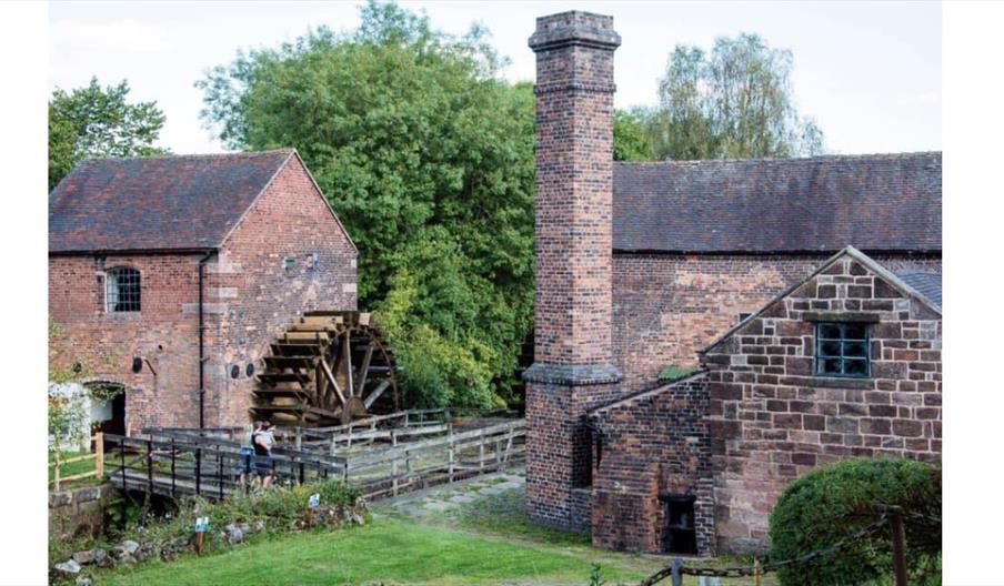exterior image of the mill wheel and buildings