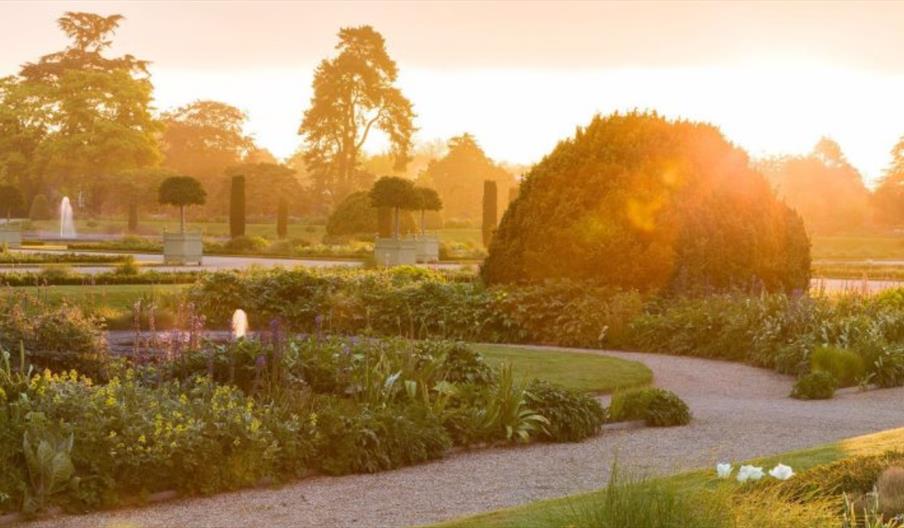 The sun rises above the Italian Gardens at The Trentham Estate, Staffordshire
