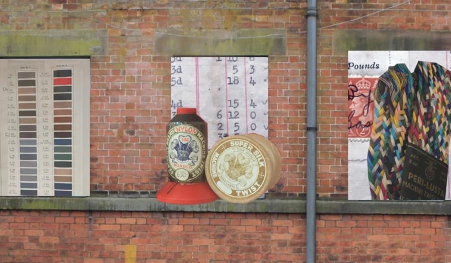 image of a building with textile image in place of windows