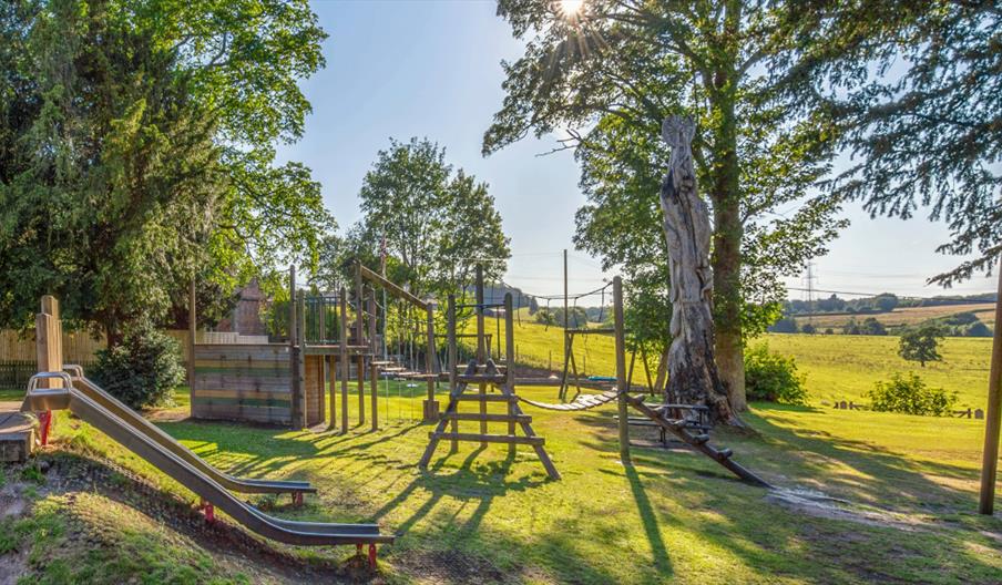 Dilhorne Recreation Playground with slide, swings and zip slide