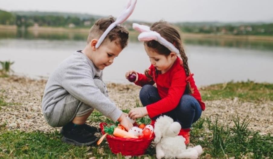 image of two children on an Easter Egg Hunt