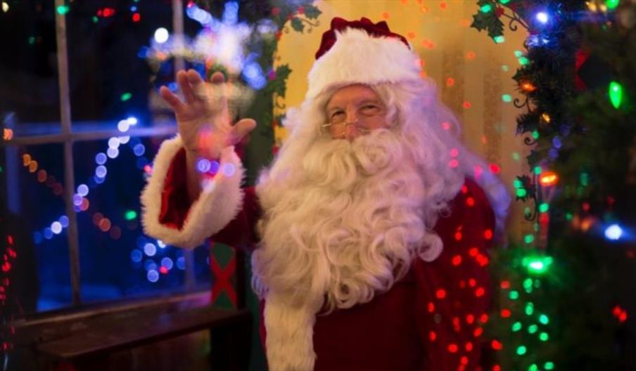 Santa waves at the camera at The Trentham Estate, Staffordshire