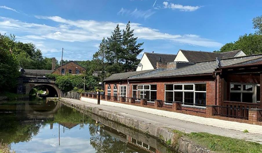 A view across the canal to The Flintlock at Cheddleton, Staffordshire
