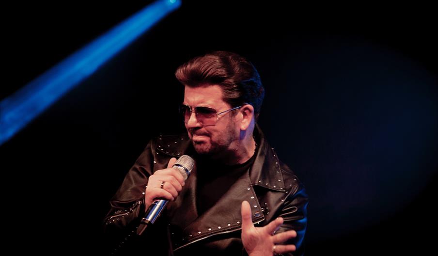 Steve Mitchell performs as George Michael