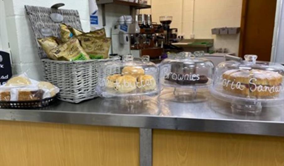A selection of cakes on display on the counter at the Hideaway at Biddulph Grange