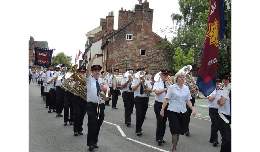 image of a Brass Band walking in the Leek Club Day Procession