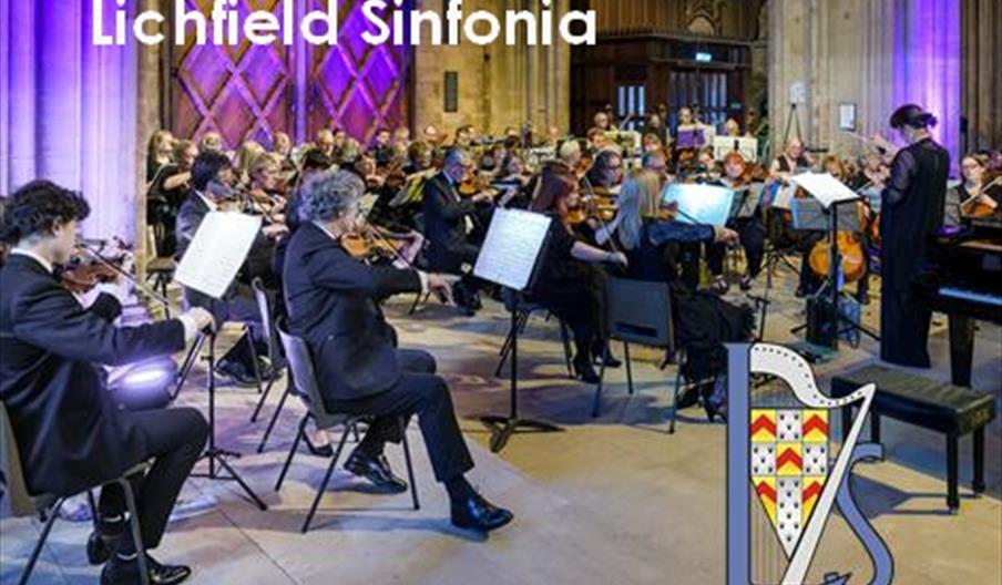 An orchestra performs in a cathedral