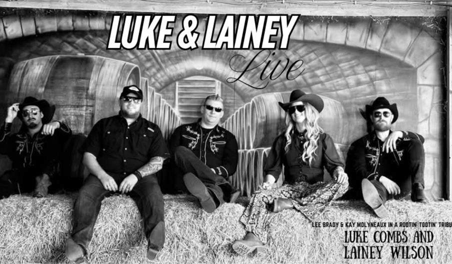 Black-and-white promotional image showing five performers dressed in Western-style outfits with cowboy hats, sitting on hay bales in front of a rustic