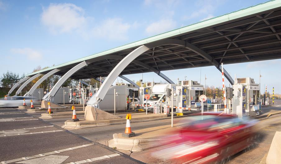 Vehicles pass through the booths on the M6 Toll Road in Staffordshire