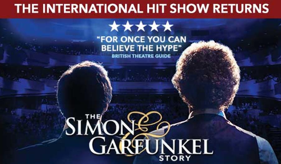 Image shows the poster for The Simon & Garfunkel Story, with a picture taken from behind the pair as they look out to the audience