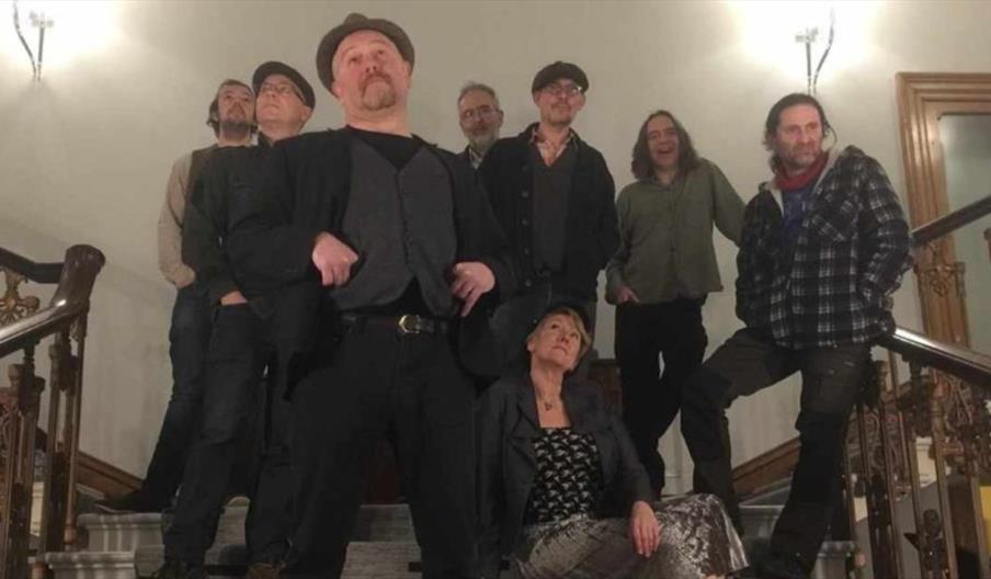 image shows the band Merry Hell