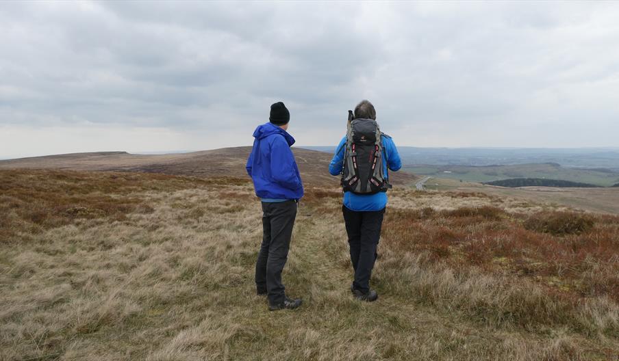 image of walkers across moorland