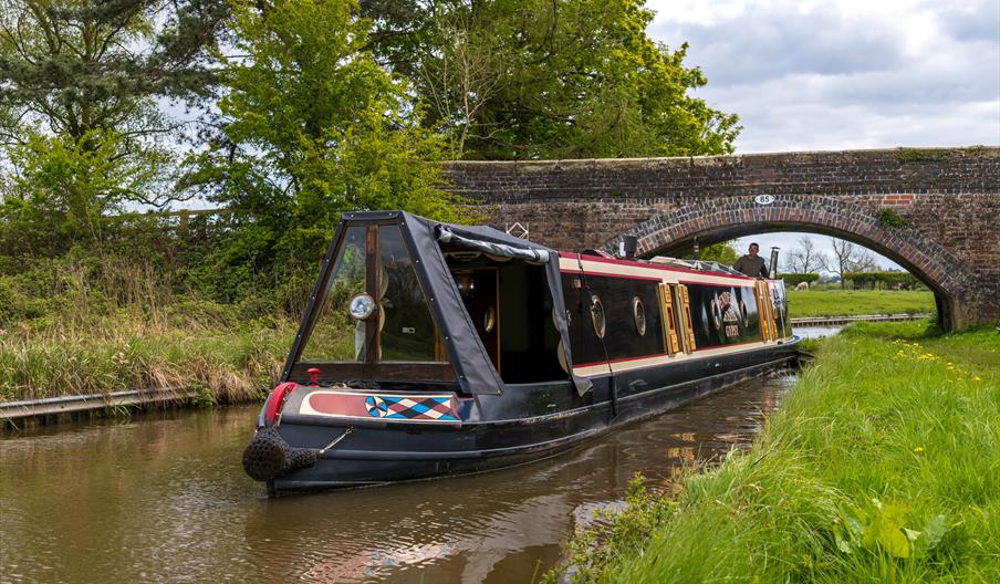 Pendelvin Gypsy narrowboat passing through 1700's canal bridge