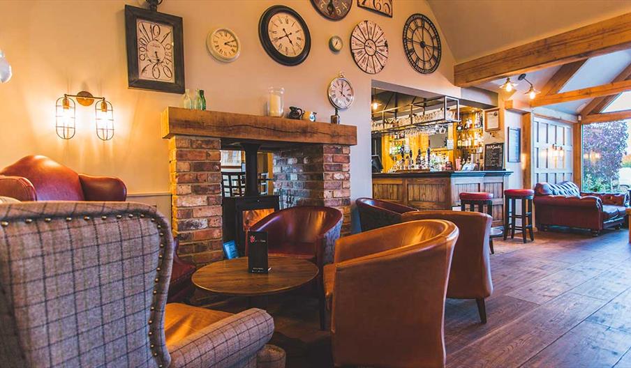 Image shows the welcoming interior of The Red Lion