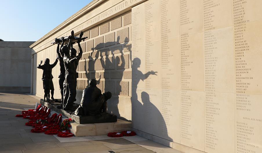 The Armed Forces Memorial bathed in sunlight at the National Memorial Arboretum, Staffordshire
