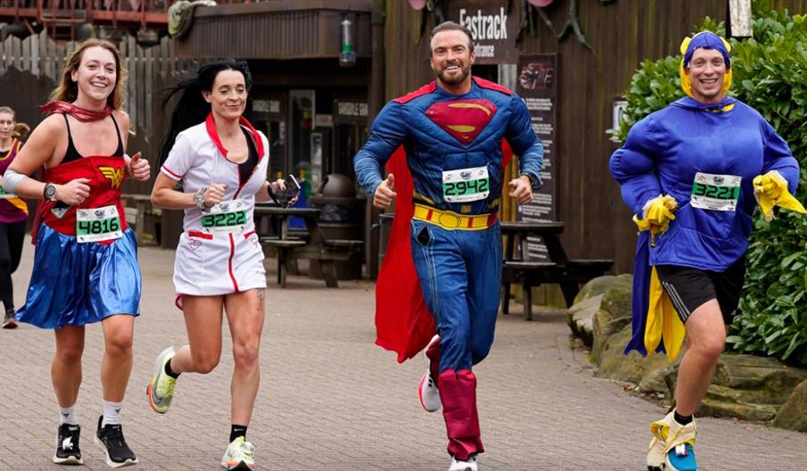 image of runners in fancy costume