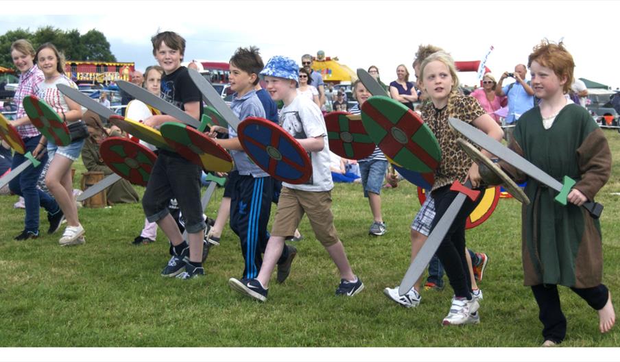 Viking re-enactment by children