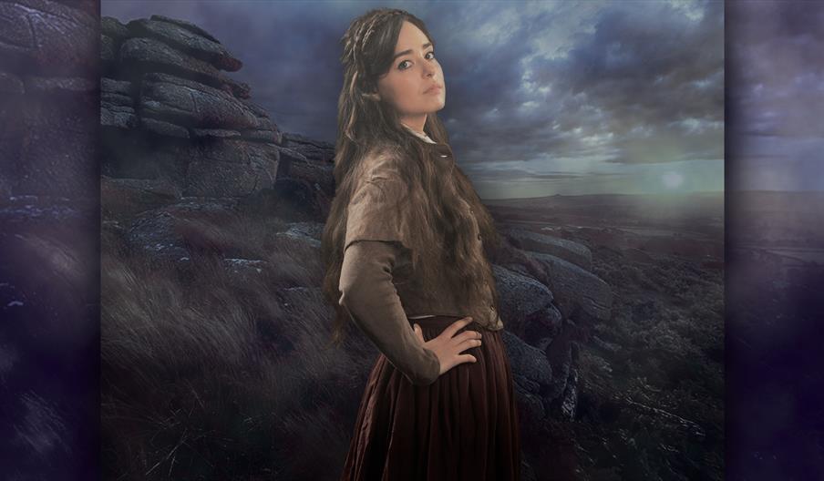 Image shows the star of Wuthering Heights, standing in front of a bleak landscape
