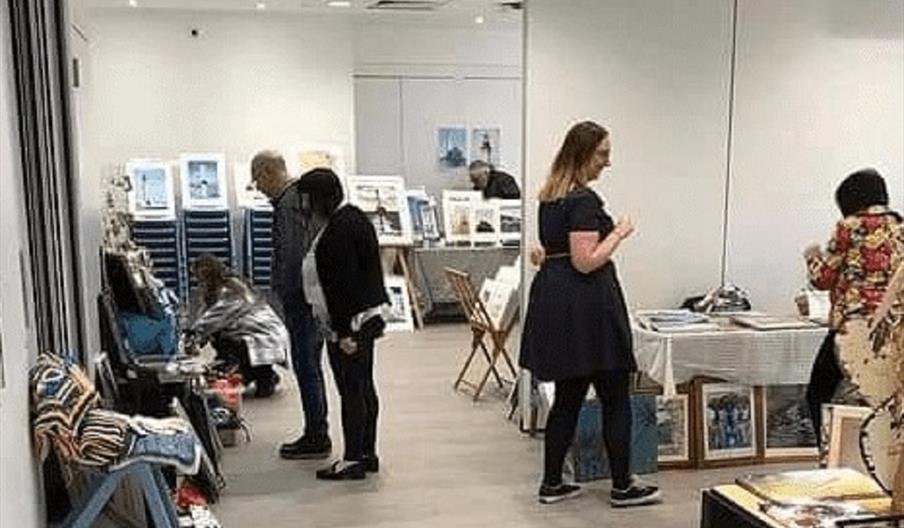 Shoppers explore the arts and crafts stands at the Brampton Museum, Staffordshire