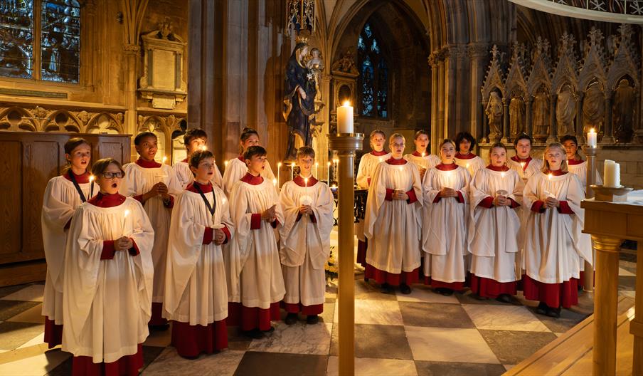 Image shows a choir in full voice inside Lichfield Cathedral