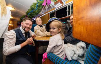 Image shows a family enjoying a festive day out on The Polar Express