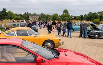 Visitors take a closer look at classic cars at The Trentham Estate