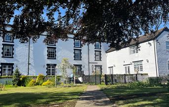 Eagle House B&B Eccleshall, Staffordshire. Exterior view of Grade II listed property from the garden.