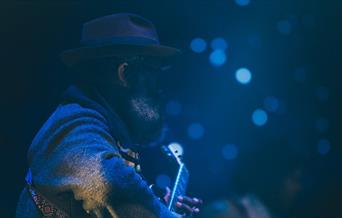 Man playing a guitar