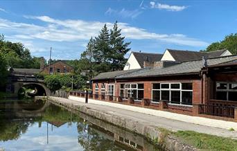 A view across the canal to The Flintlock at Cheddleton, Staffordshire
