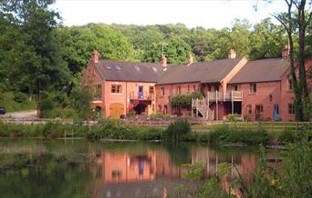 View across the lake to Foxtwood Cottages