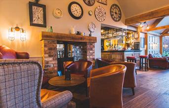 Image shows the welcoming interior of The Red Lion
