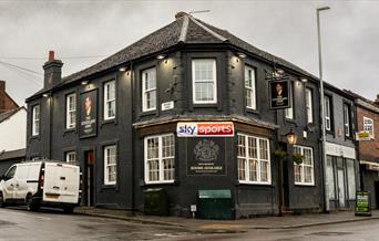 The Sutherland Arms, captured from across the road on a grey, rainy day