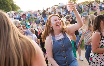 A visitor enjoys great live music at one of The Trentham Estate's Summer Concerts