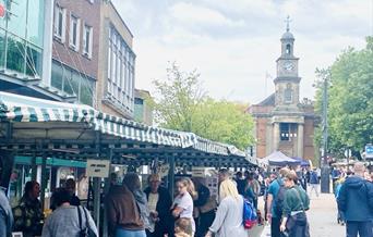 Image shows stalls and shoppers in Newcastle-under-Lyme town centre for the Castle Artisan Market