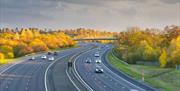 Cars flow freely along the M6 Toll Road in Staffordshire