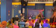 People enjoying a talk at the Philip Astley Centre