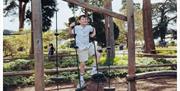 Child playing at the Adventure Playground at Trentham Estate